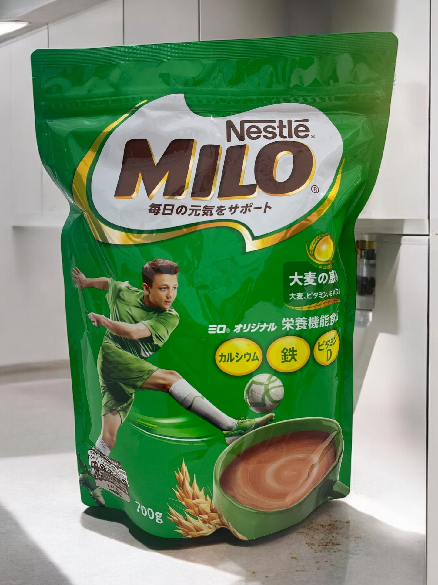 Nestle Milo 700g malt drink with cocoa, milk, vitamins, and minerals in original Costco packaging.