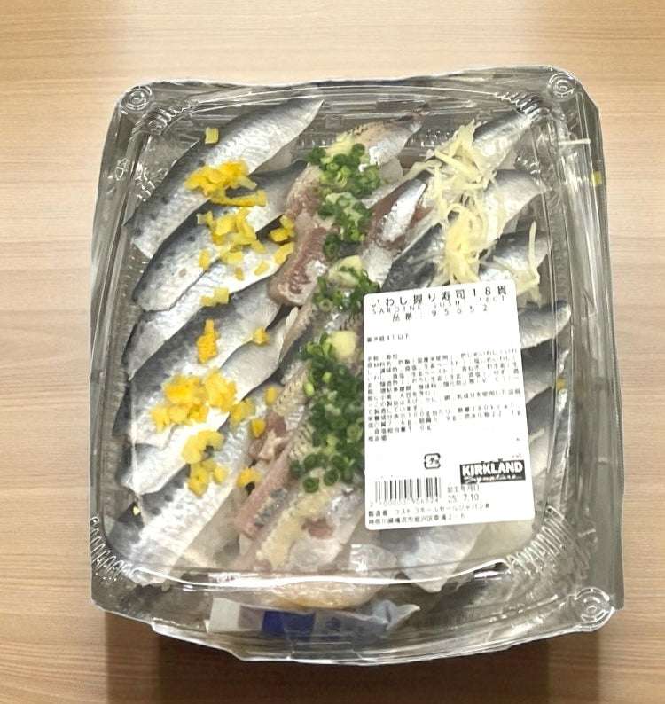 Costco sushi iwashi nigiri set with 18 pieces of vinegared and salted sardine sushi.