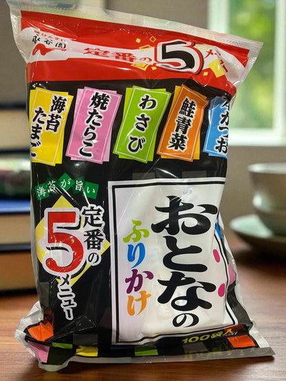 Bag of Nagatanien Otona no Furikake rice seasoning with five flavors including seaweed egg, grilled cod roe, wasabi, salmon greens, and bonito, 100-pack.